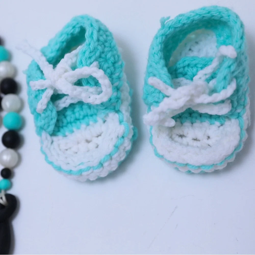 Set of crocheted baby shoes and teal baby teething necklace chewy shower newborn